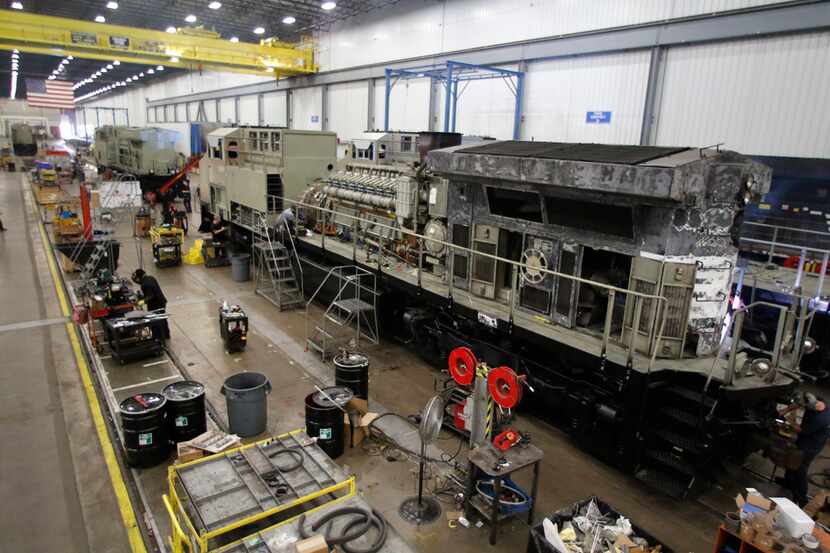 Locomotives on the assembly are being refurbished at the GE Manufacturing locomotive...