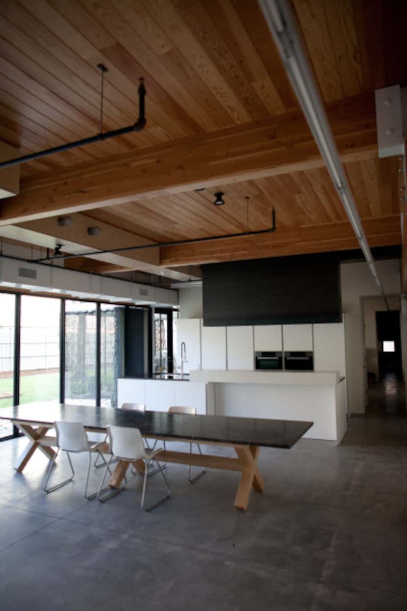 Douglas-fir beams, concrete floors and exposed ductwork give the 4,410-square-foot interior...
