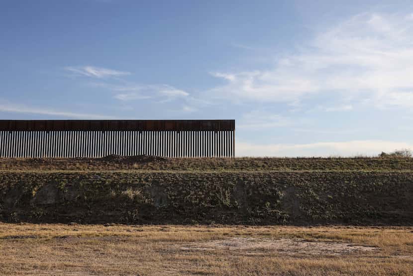 New section of the wall on the border with Mexico continues in contruction under the...