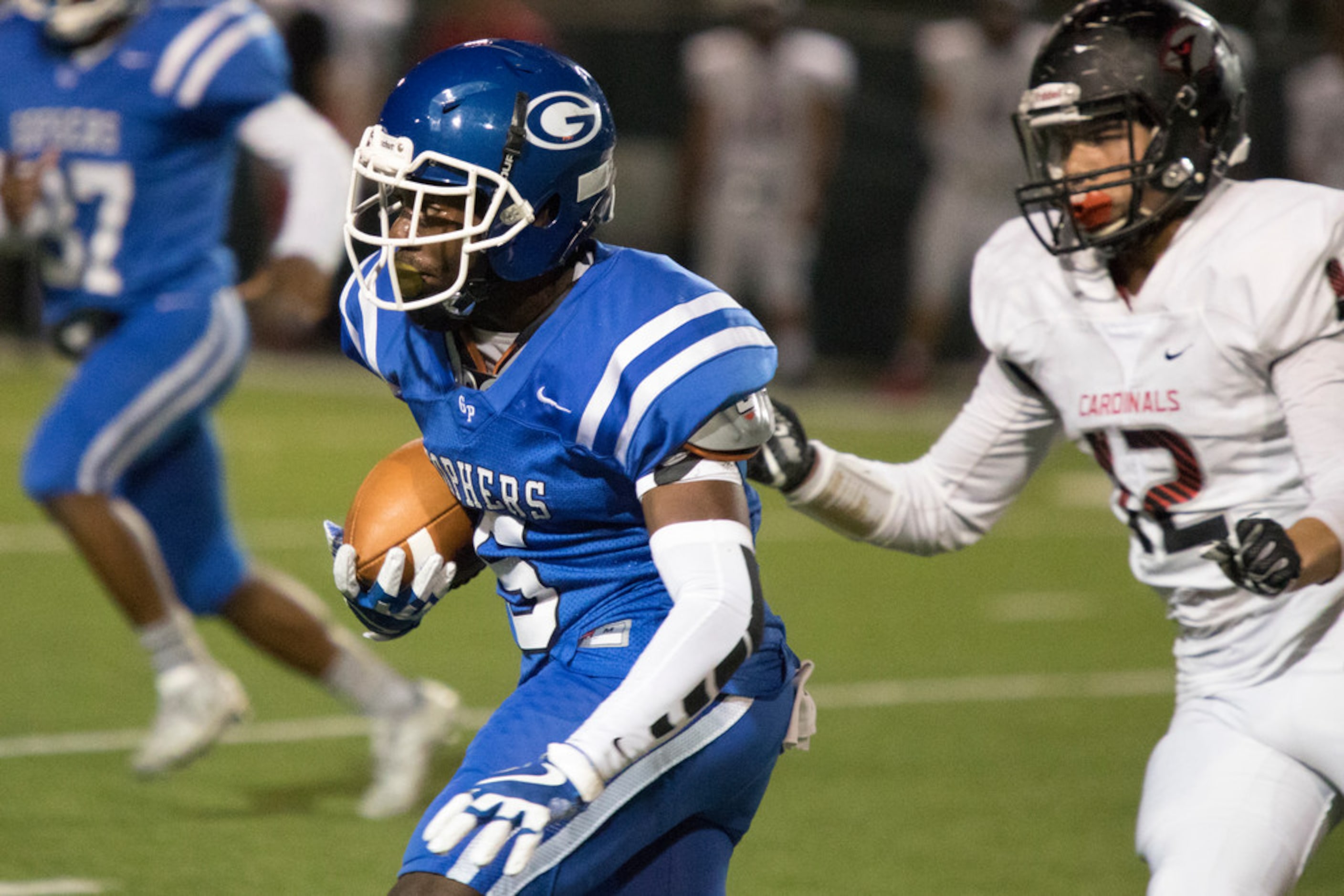 Grand Prairie running back Tylexis Straughter (6) rushes during a District 7-6A matchup...