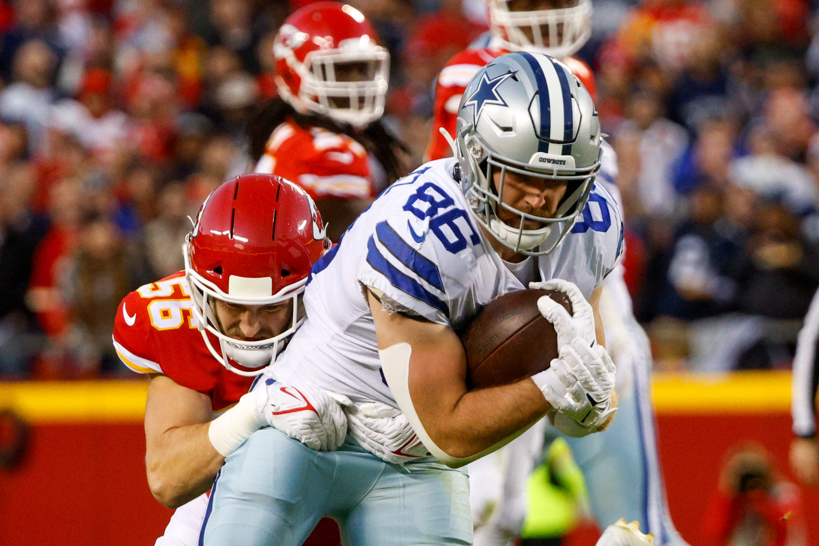 Kansas City Chiefs outside linebacker Ben Niemann (56) tackles Dallas Cowboys tight end...