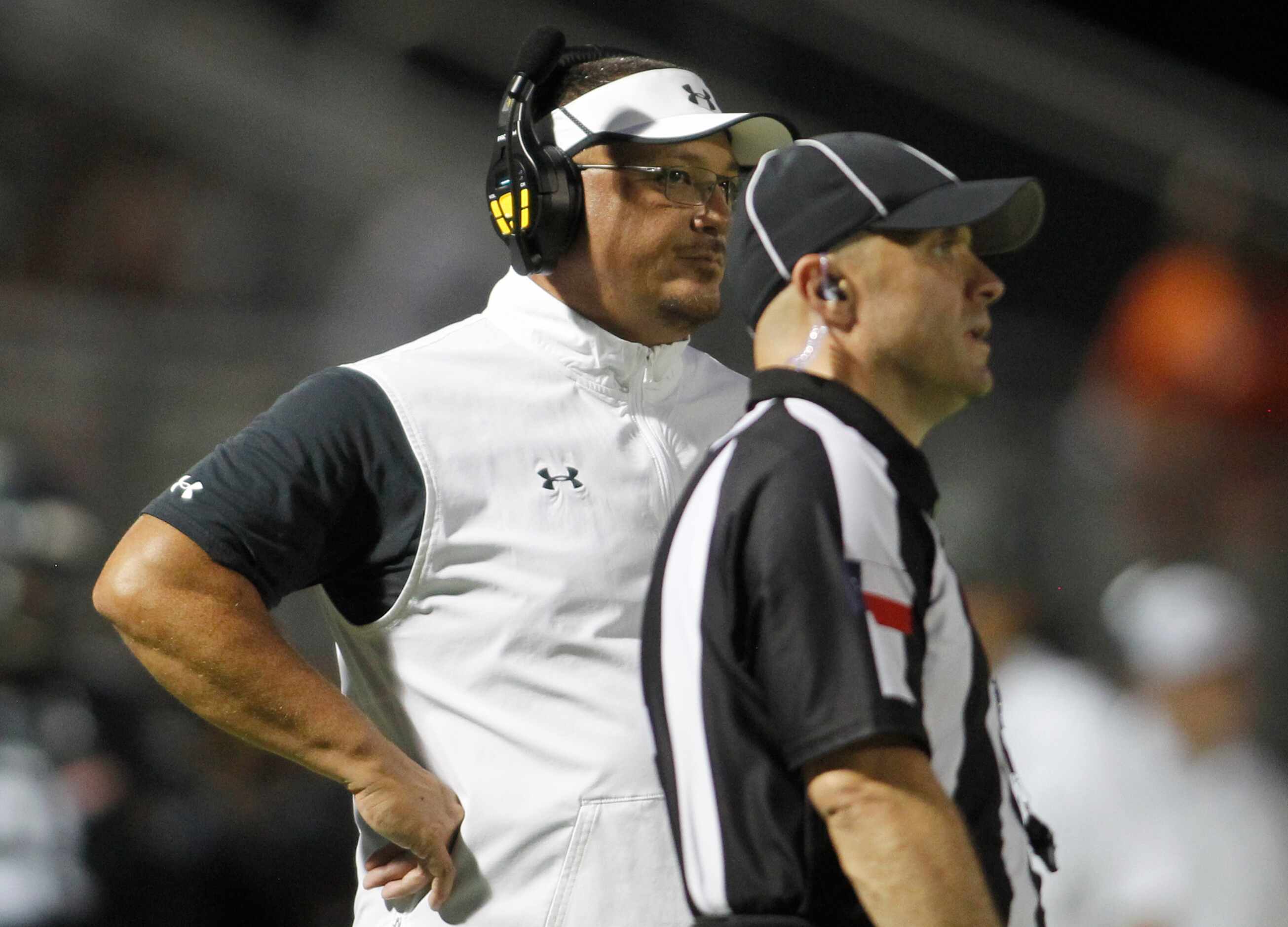 Mansfield Timberview head coach James Brown reacts following a interference called against...