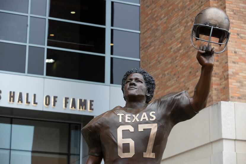Friday morning the Texas Longhorns unveiled a 12½-foot statue of  Julius Whittier, the...