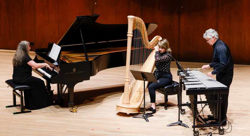 Pianist Liudmila Georgievskaya, harpist Emily Levin and percussionist Drew Lang perform "As...