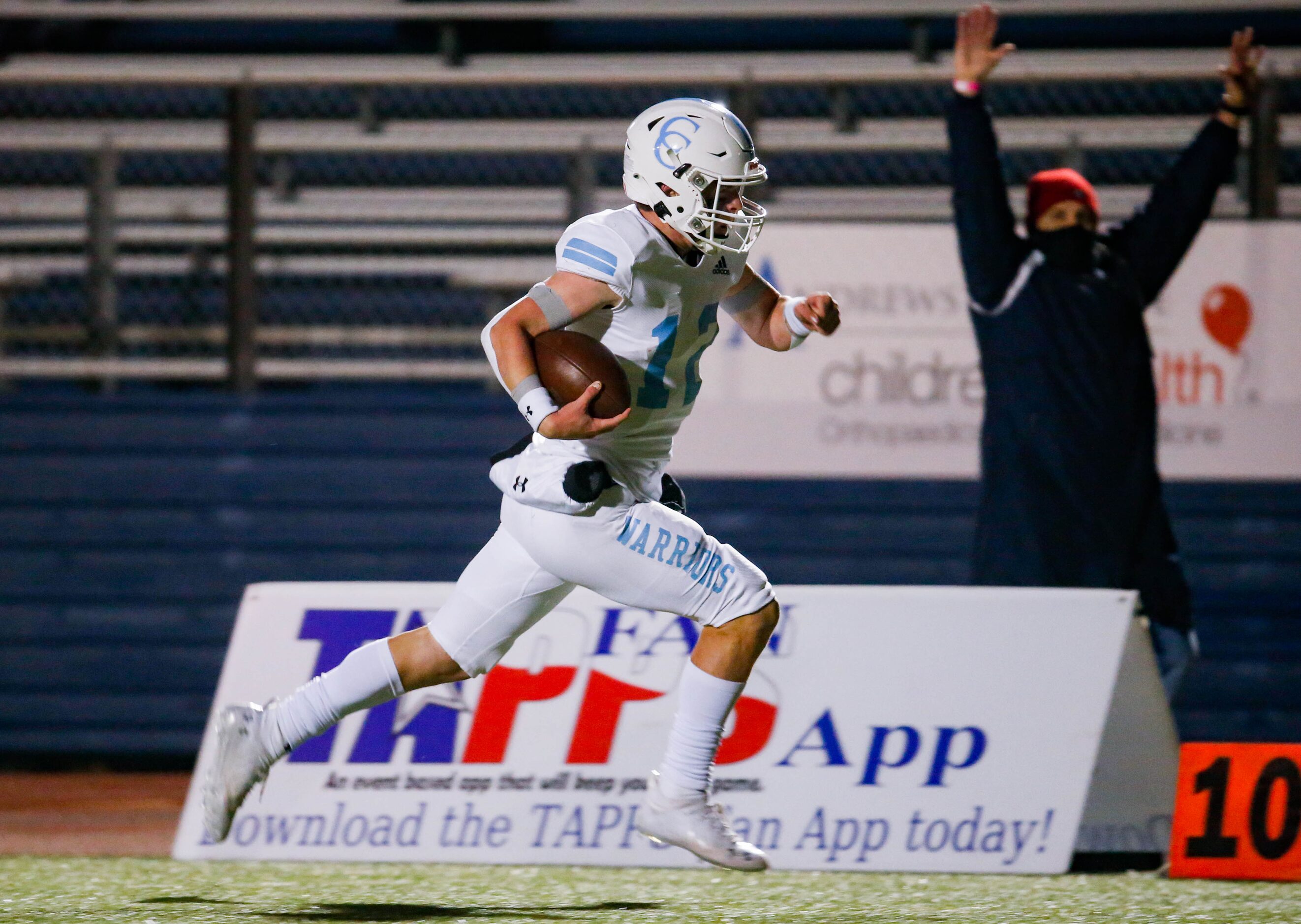 Cypress Christian's quarterback Maxwell Landrum (12) runs in for a touchdown against...