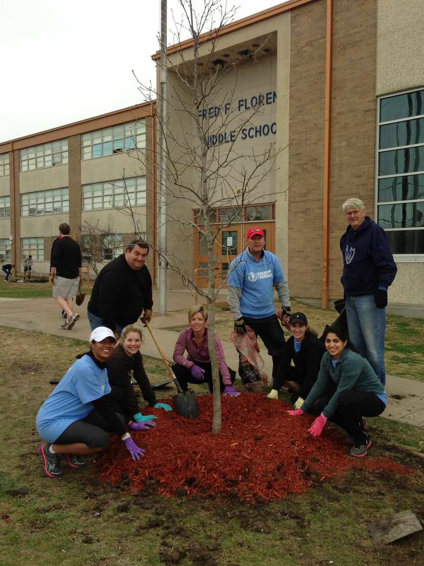 
Members of the Mahatma Gandhi Memorial of North Texas committee plant 40 trees around the...