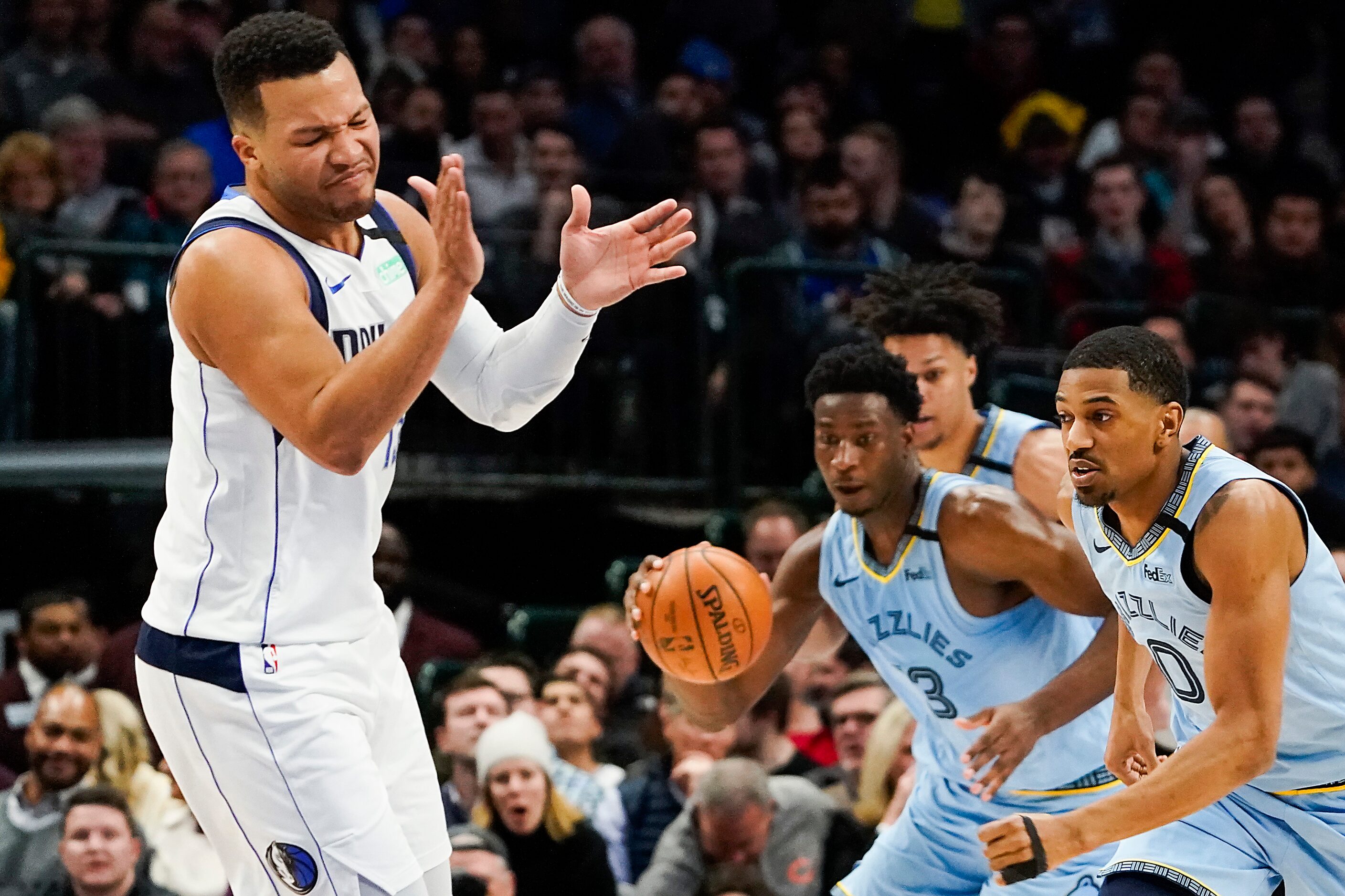 Dallas Mavericks guard Jalen Brunson reacts after turning the ball over to Memphis Grizzlies...