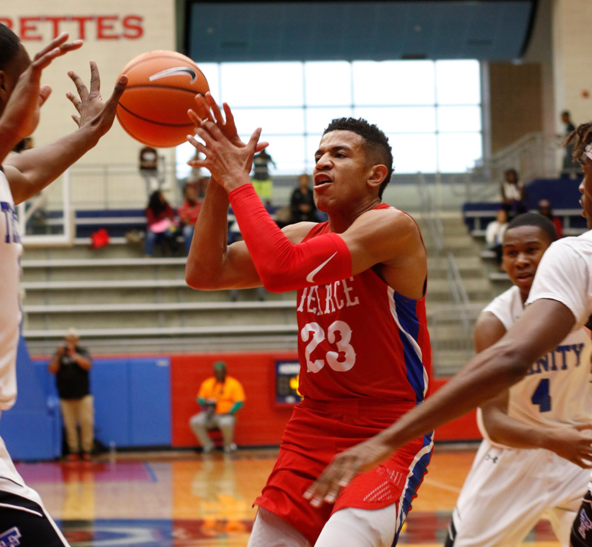 Richardson JJ Pearce guard Sterling Hopkins (23) gets the ball knocked away by Trinity...