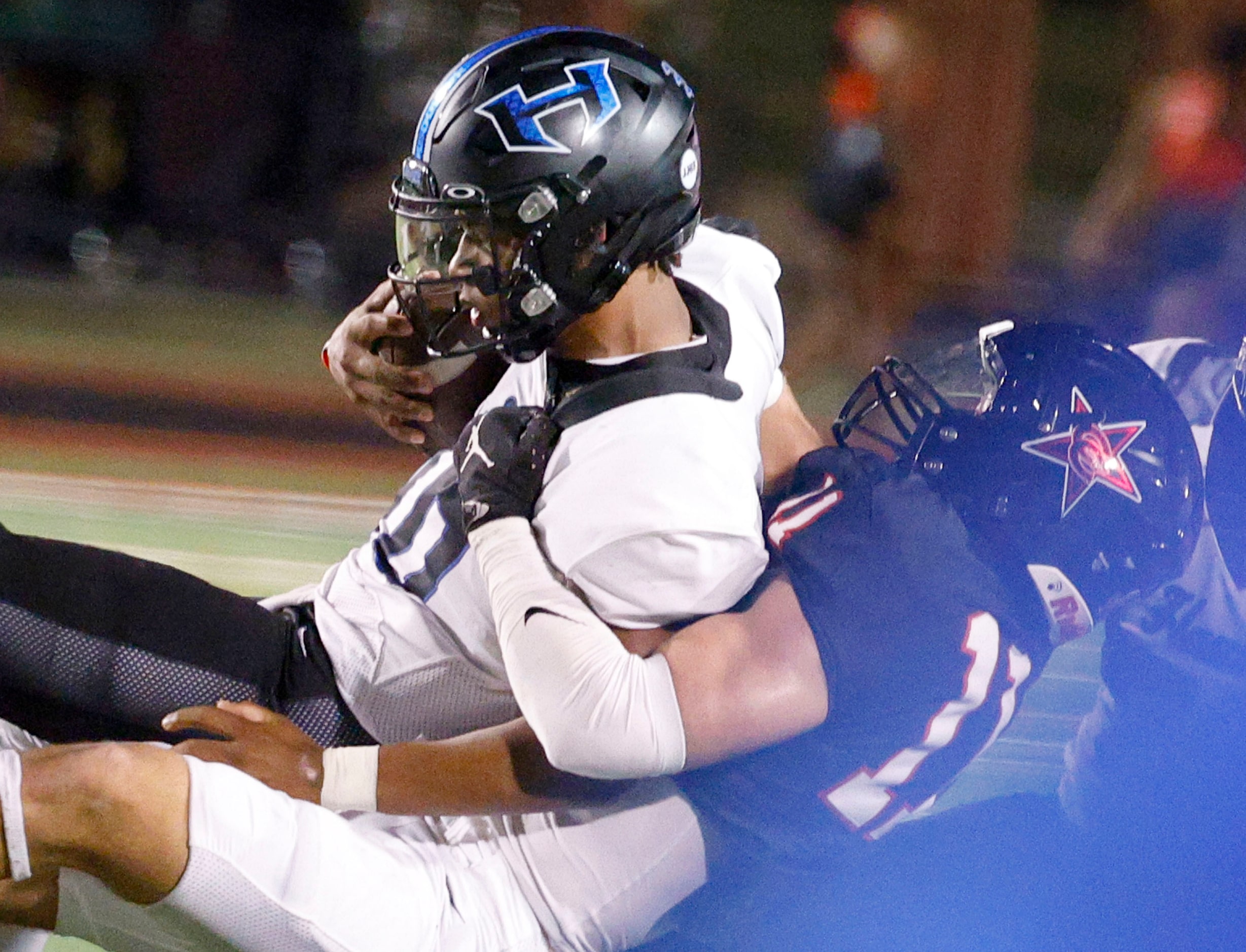 Hebron's quarterback Patrick Crayton Jr. (10) is sacked by Coppell's Weston Polk (11) in the...