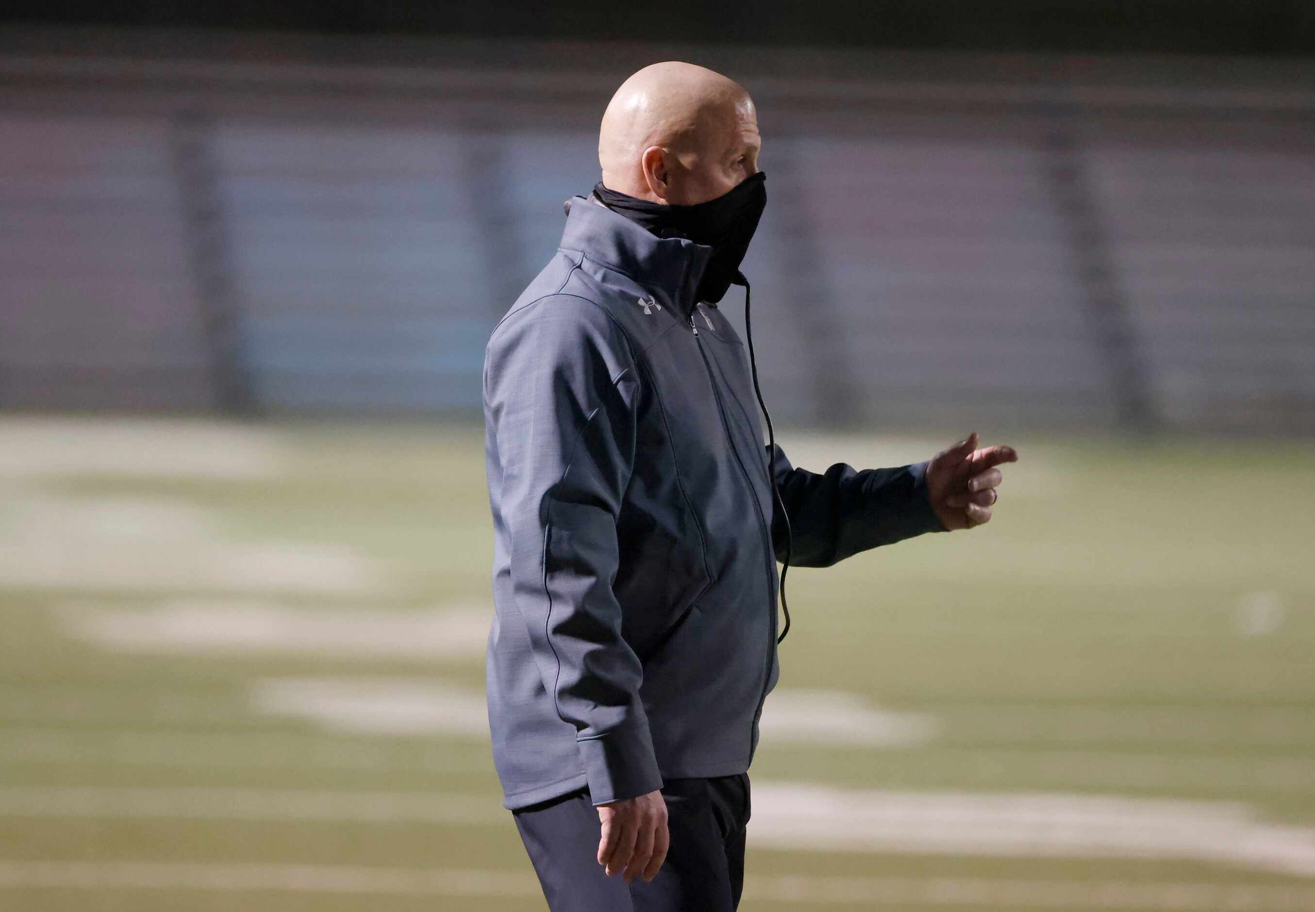 Arlington Martin head coach Bob Wager directs is team against Lewisville during Class 6A...