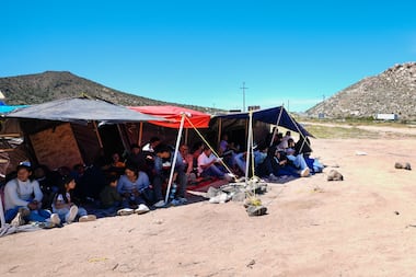 Asylum seekers awaited processing last week after crossing the border between Mexico and the...