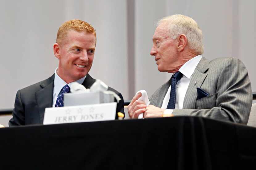 Dallas Cowboys owner Jerry Jones (right) and head coach Jason Garrett talk during the...