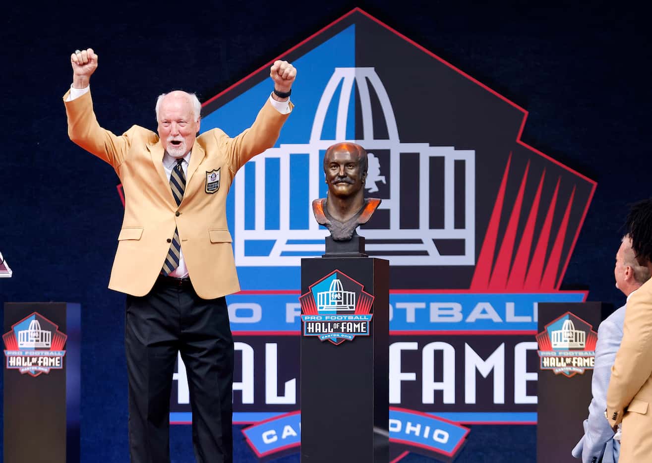 Pro Football Hall of Fame inductee Cliff Harris of the Dallas Cowboys reacts after unveiling...