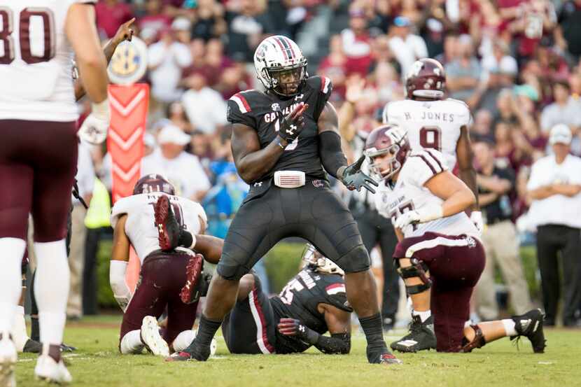 South Carolina defensive lineman Javon Kinlaw (3) celebrates a play during the second half...
