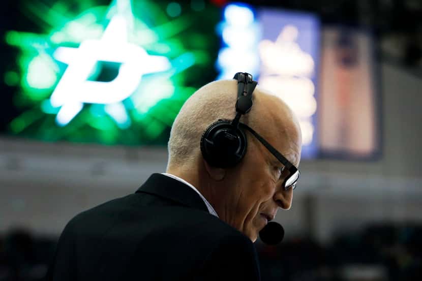 Dallas Stars play-by-play caller, Dave Strader calls the game during the first period of...