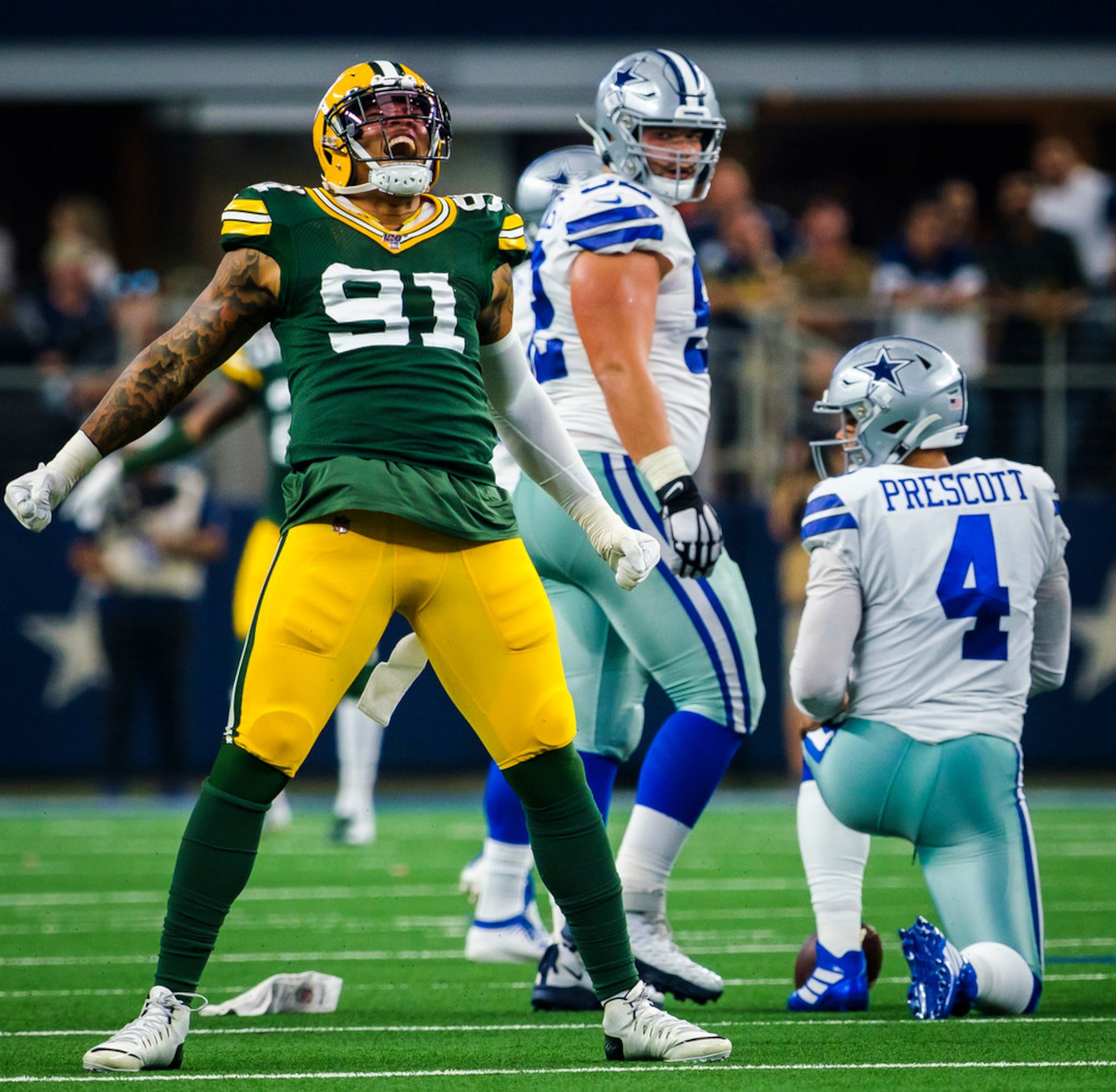 Green Bay Packers outside linebacker Preston Smith (91) celebrates after sacking Dallas...