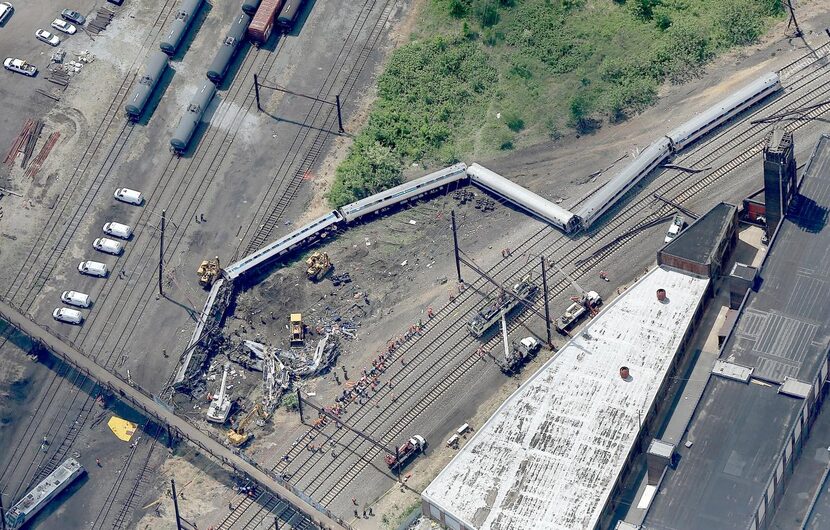 
The locomotive and all seven passenger cars left the track as the train made a left turn....