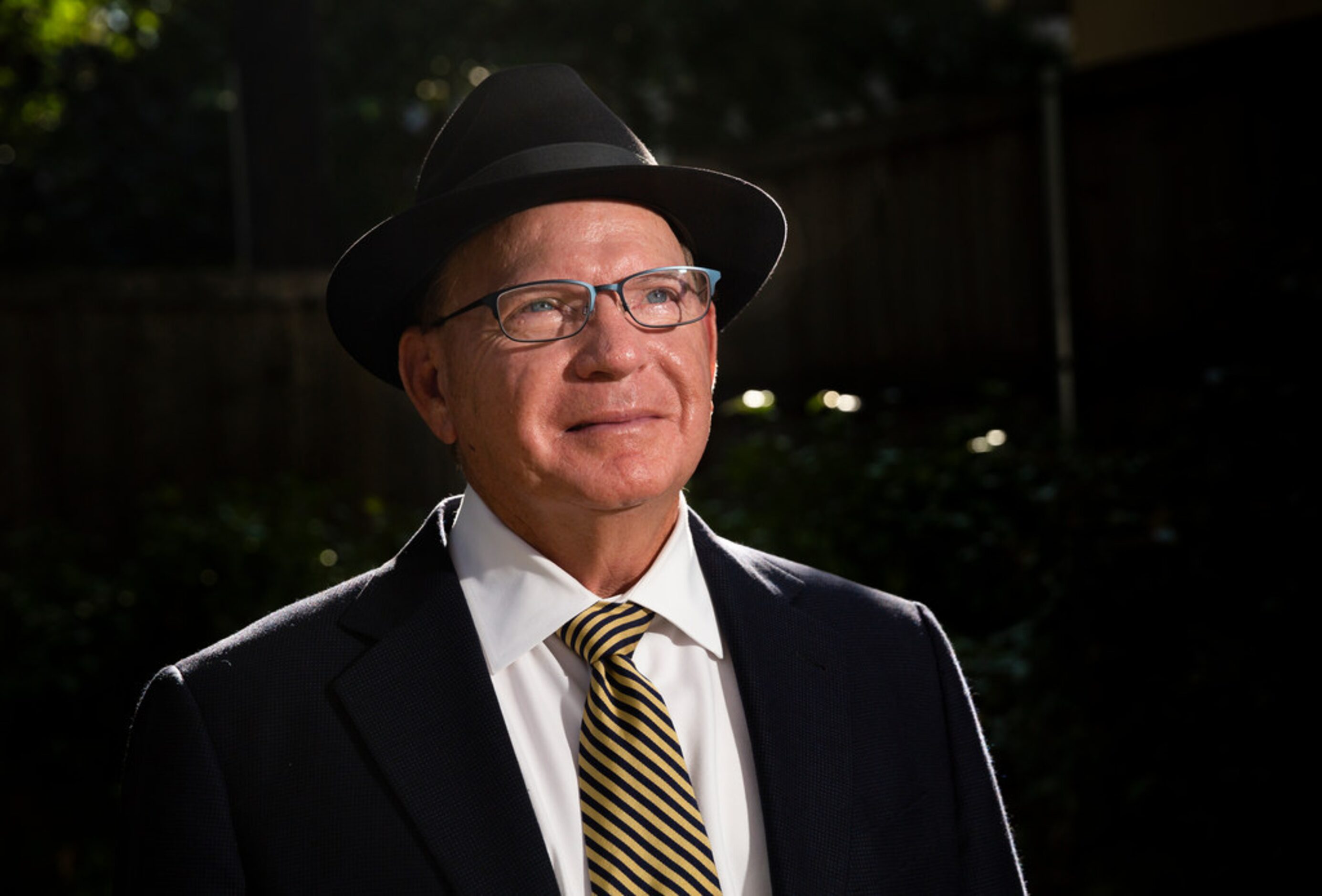 Highland Park football coach Randy Allen poses for portraits in the backyard of his Highland...