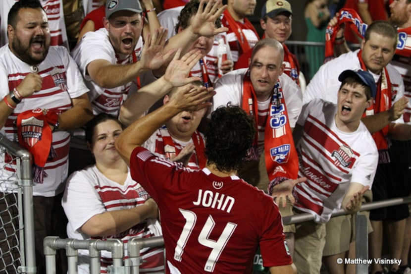 FC Dallas fan favorite George John, #14, waves to the crowd.