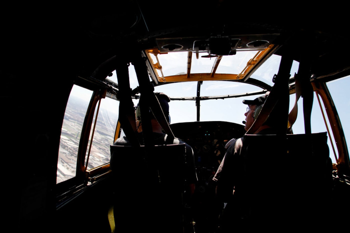 Pilot Will Dismukes, left and co-pilot Eric Whyte with the Collins Foundation fly a North...