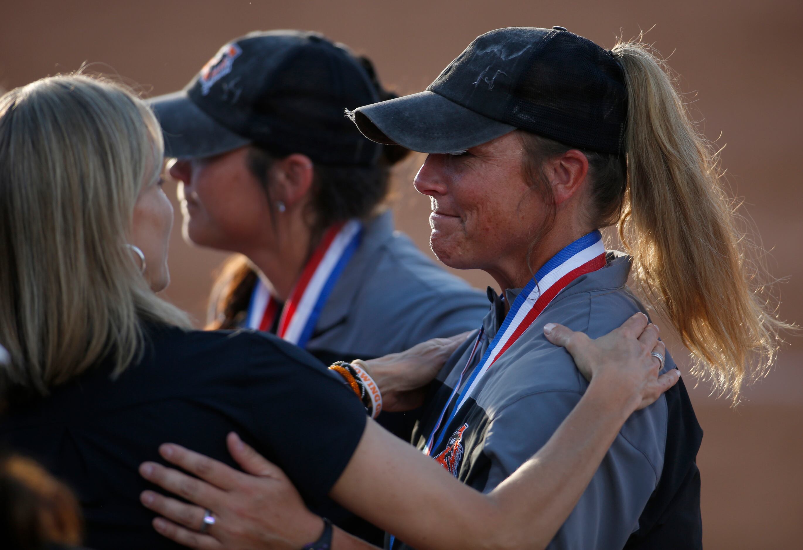 Aledo head coach Heather Myers, right, receives well wishes on the field following their 4-1...