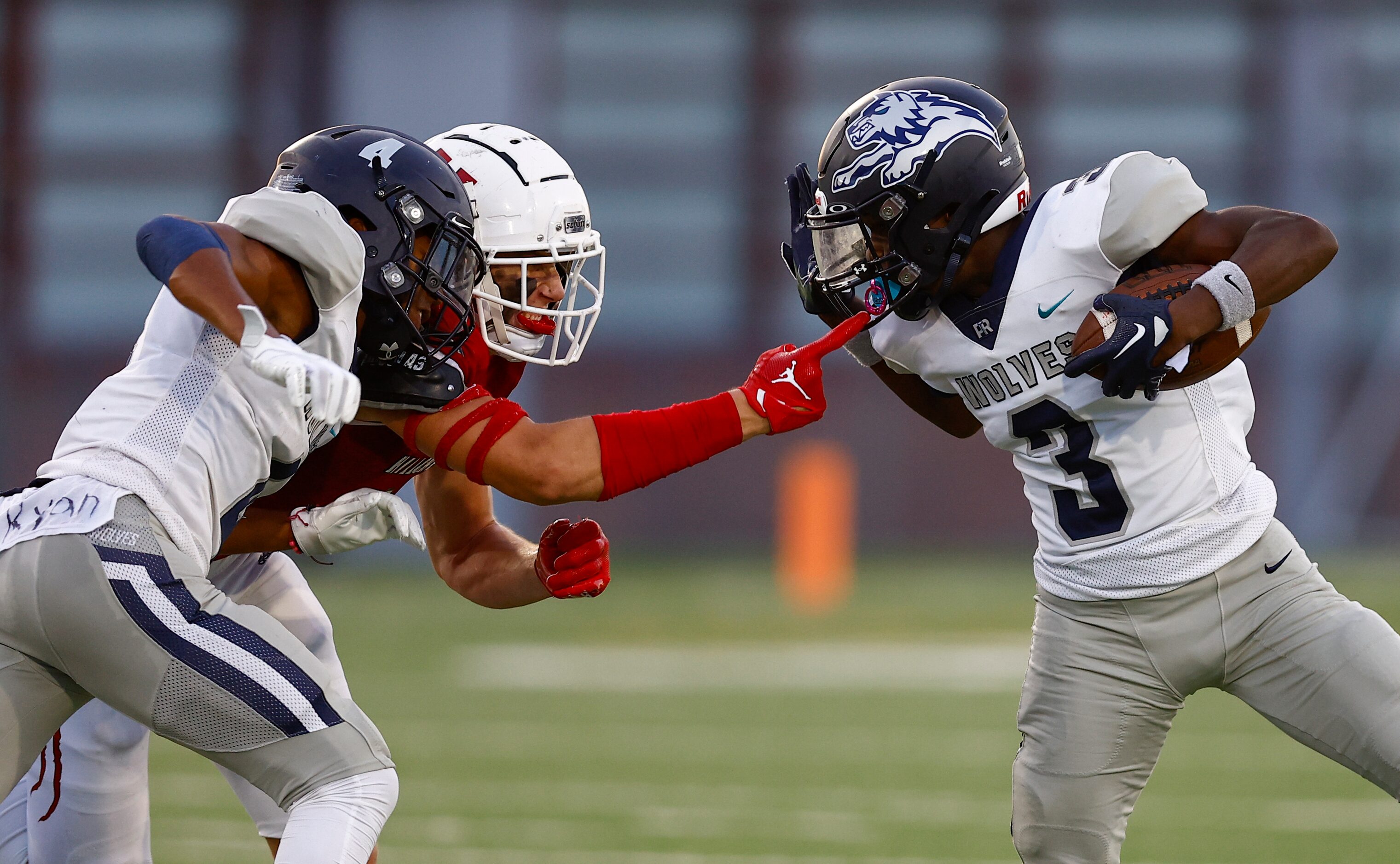 Carrollton Ranchview senior wide receiver Dejan Adams (3) battles Hillcrest junior defensive...