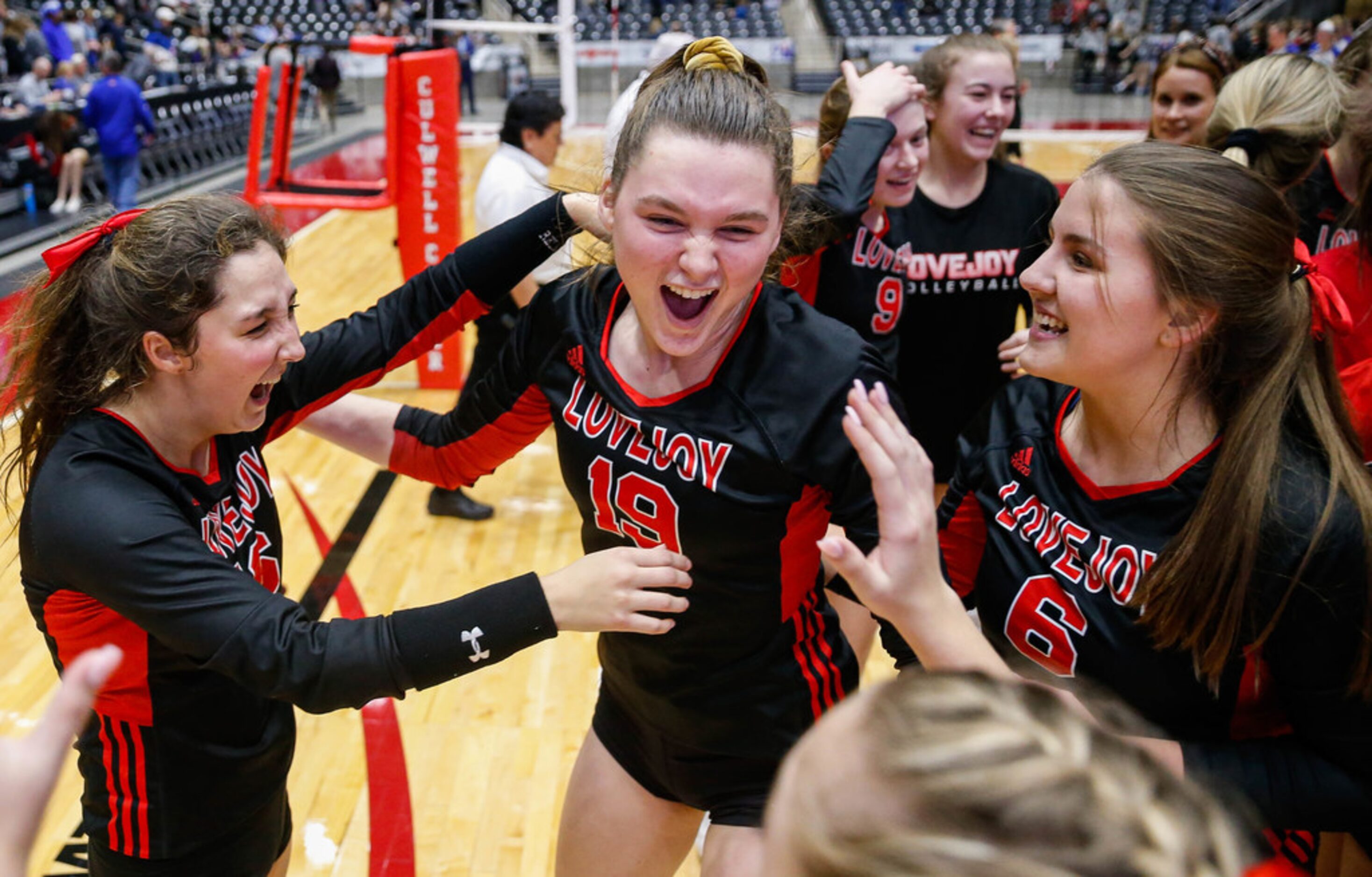 LovejoyÃs Lexie Collins (19) (center) celebrates with her team after beating Friendswood in...