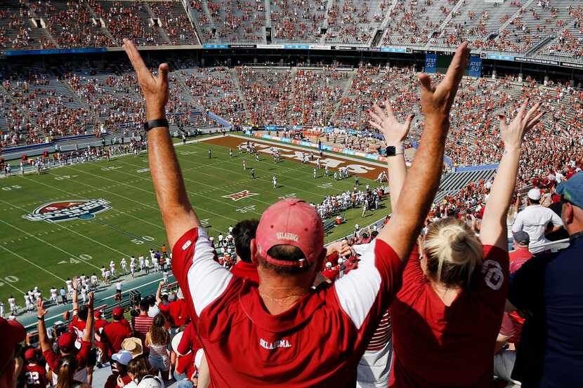 Oklahoma Sooners fans cheer as it appeared they scored the first touchdown of the Red River...