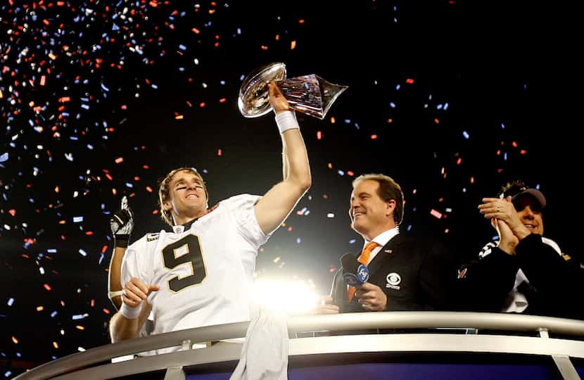 ORG XMIT: 1084178 New Orleans Saints quarterback Drew Brees celebrates with the Vince...