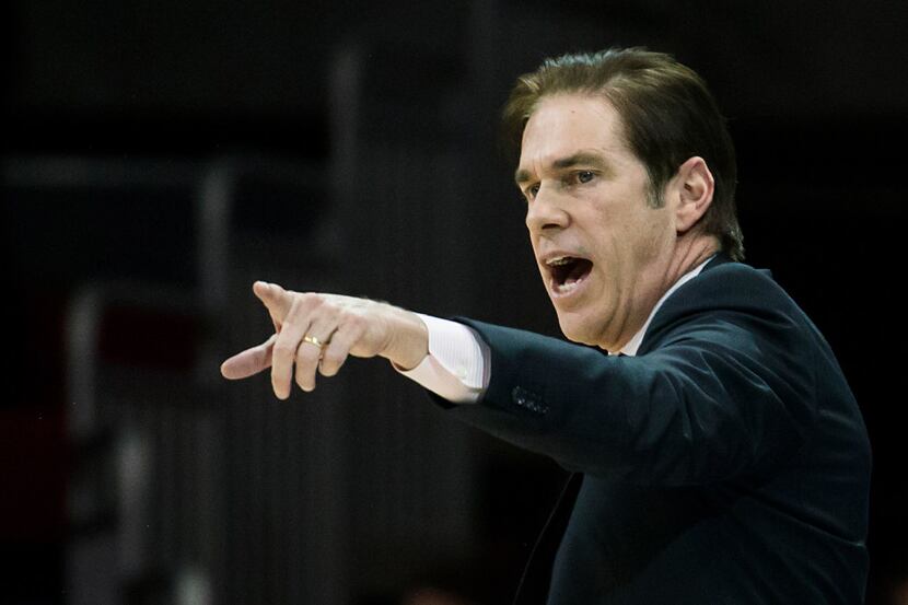 FILE - SMU head coach Tim Jankovich directs his team during an NCAA basketball game against...