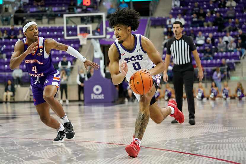 TCU guard Micah Peavy (0) drives past Northwestern State guard JaMonta' Black (4) during the...