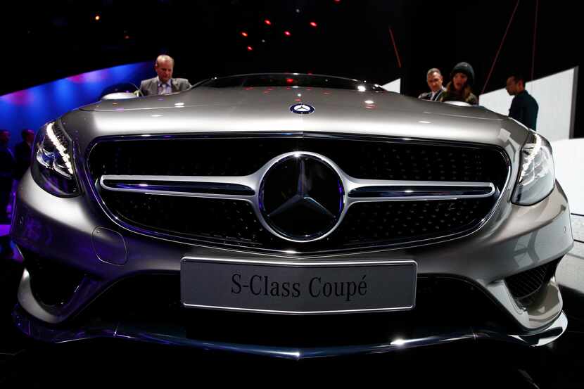 A Mercedes-Benz S-Class coupe automobile, produced by Daimler AG, stands on display...