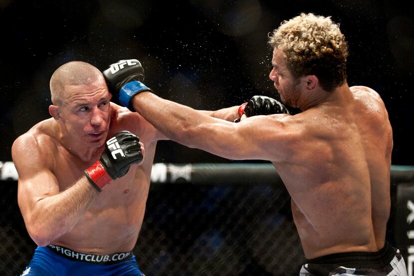 Georges St-Pierre (L) from Montreal, Canada battling with Josh Koscheck from Waynesburg US...