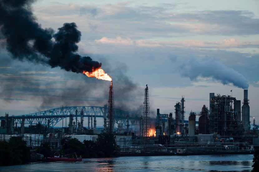 Flames and smoke emerge from the Philadelphia Energy Solutions Refining Complex in...