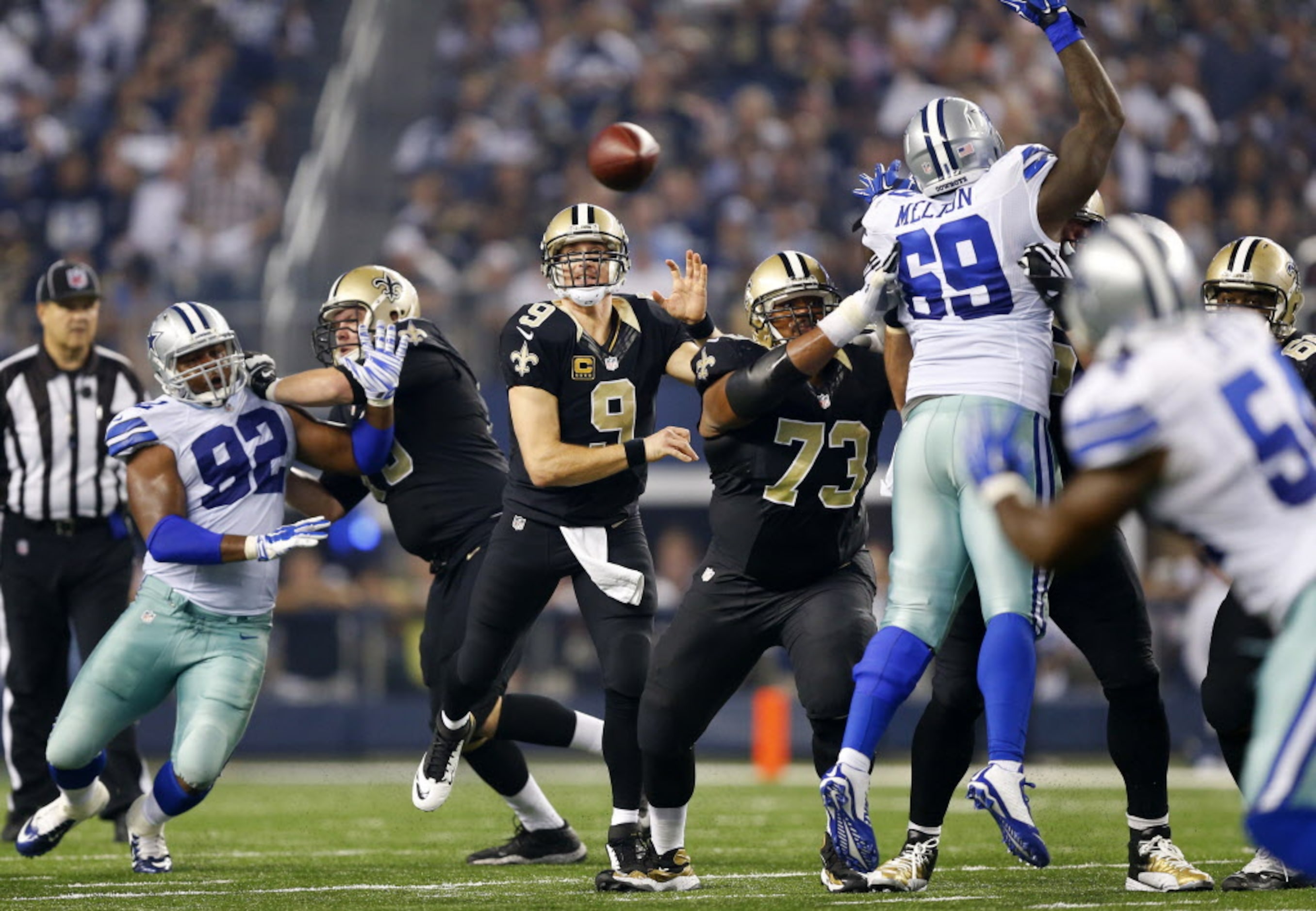 New Orleans Saints quarterback Drew Brees (9) throws a third quarter pass as the Dallas...