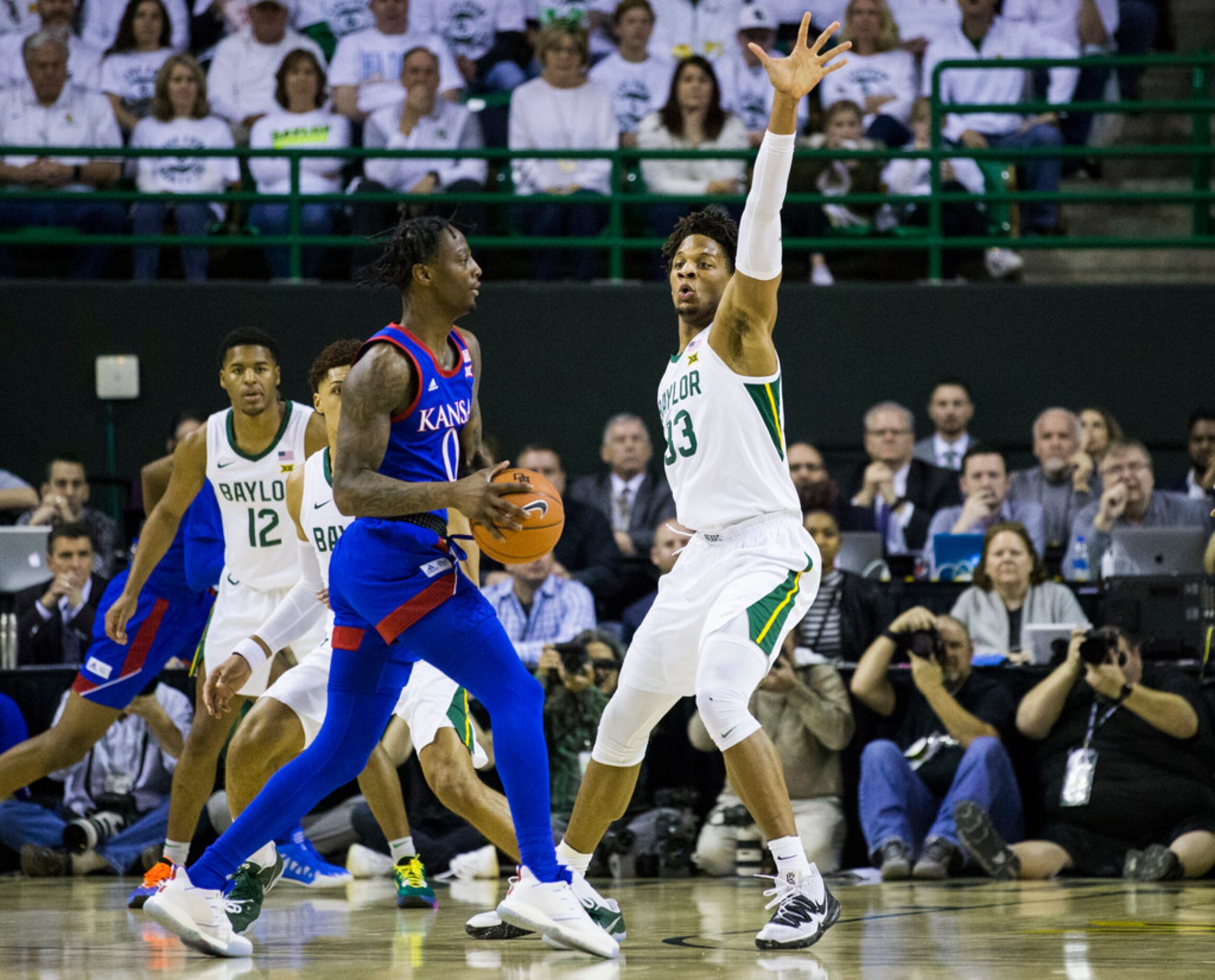 Baylor Bears forward Freddie Gillespie (33) defends against Kansas Jayhawks guard Marcus...