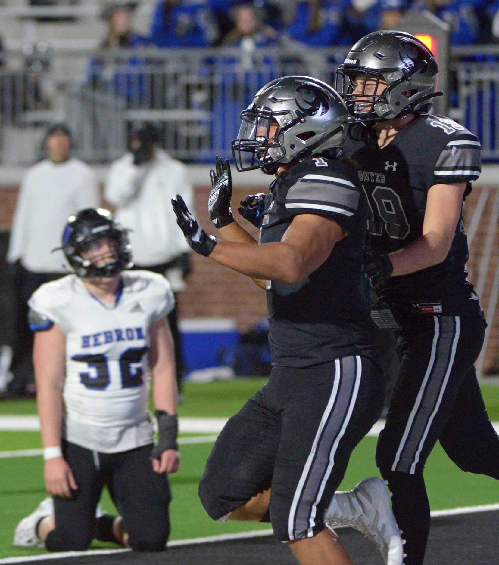 Guyer's Kaedric Cobbs (1) and Seth Meador (19) celebrate after Cobbs touchdown in the second...