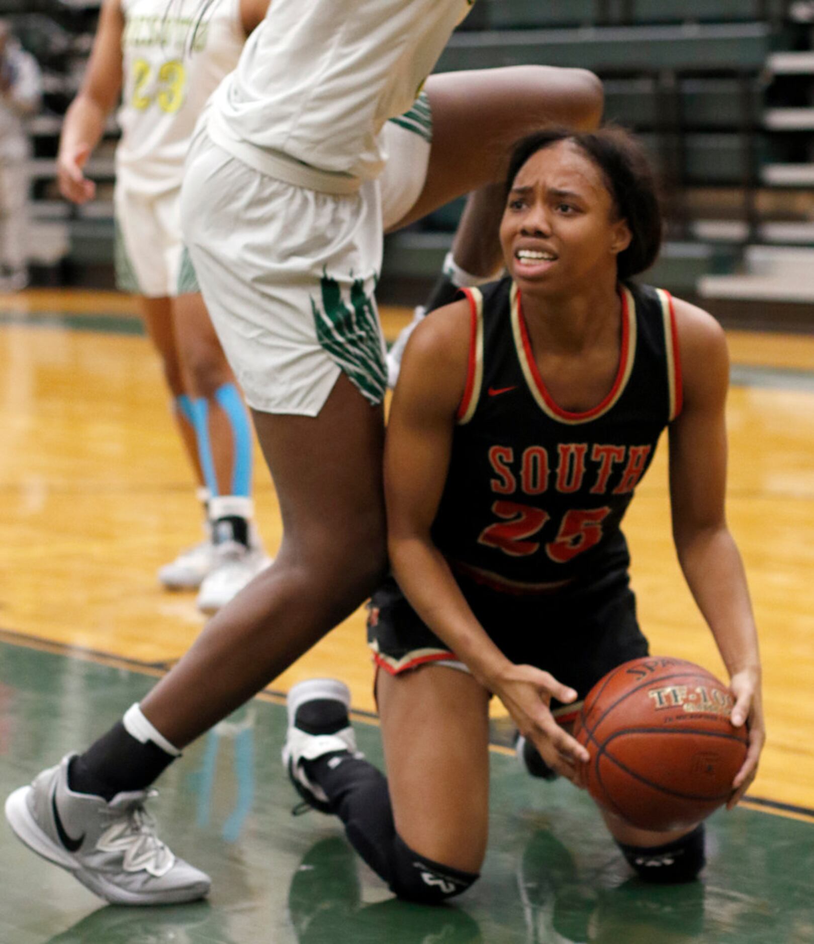 South Grand Prairie's Madison Jean-Louis (25) reacts to a lack of  penalty call during...