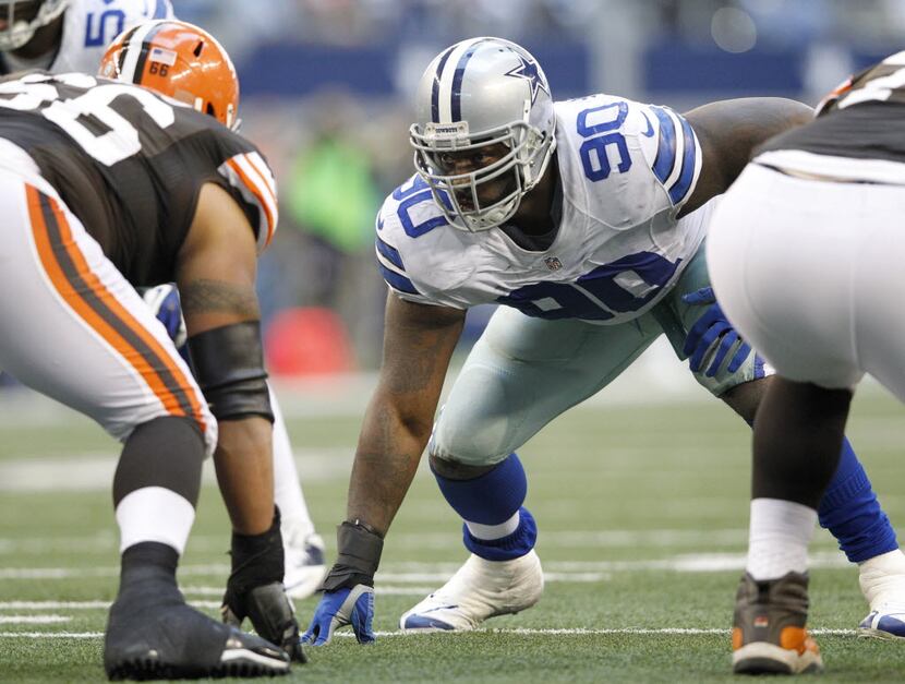FILE - Dallas Cowboys nose tackle Jay Ratliff (90) lines up across from Cleveland Browns...