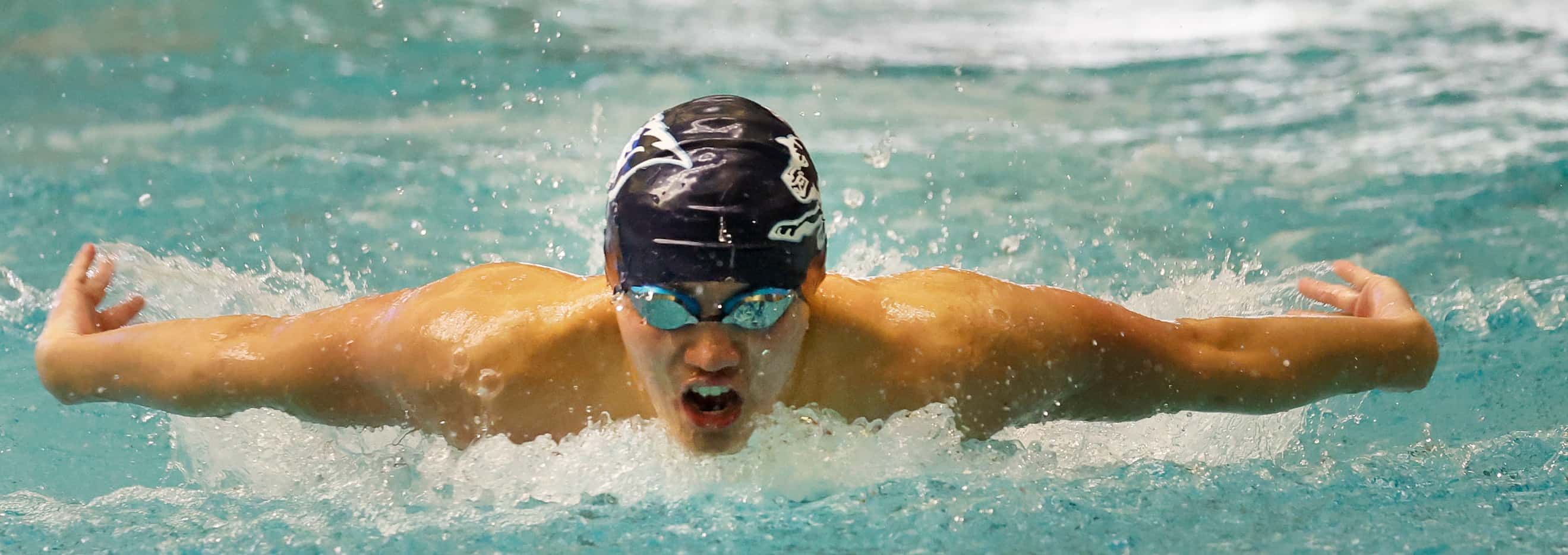 Carrollton Ranchview Cody Le competes in boys 100 yard Butterfly In Class 4A state swimming...