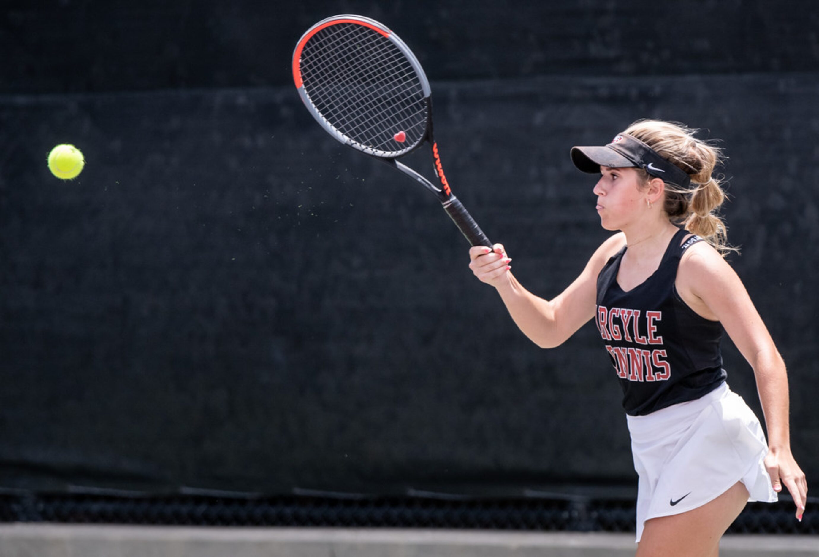 Argyle's Zoe Zablosky returns the ball in a doubles match with teammate Sarah Oellermann in...