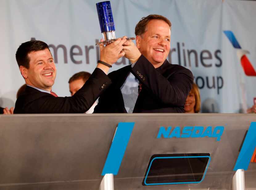 Robert McCooey, Jr. Sr. VP at Nasdaq and Doug Parker, CEO of the new American Airlines hold...