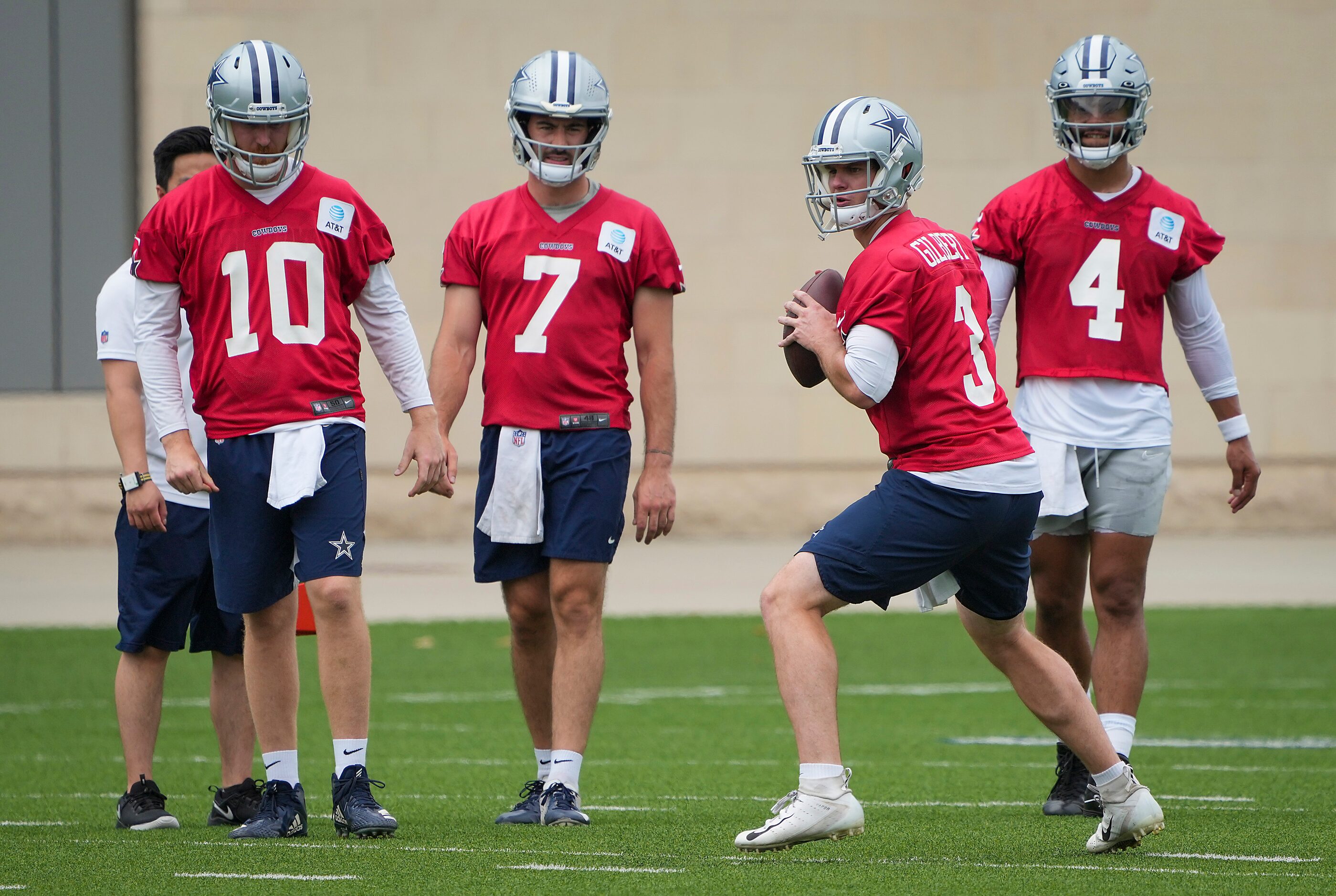 Dallas Cowboys quarterbacks Cooper Rush (10), Ben DiNucci (7), Garrett Gilbert (3) and Dak...