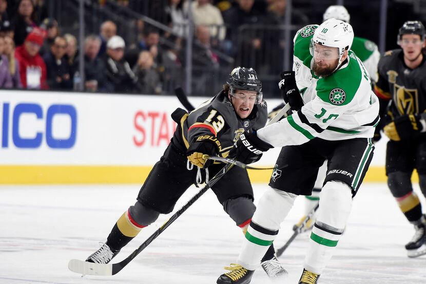 Vegas Golden Knights left wing Brendan Leipsic (13) attempt to block a pass by Dallas Stars...