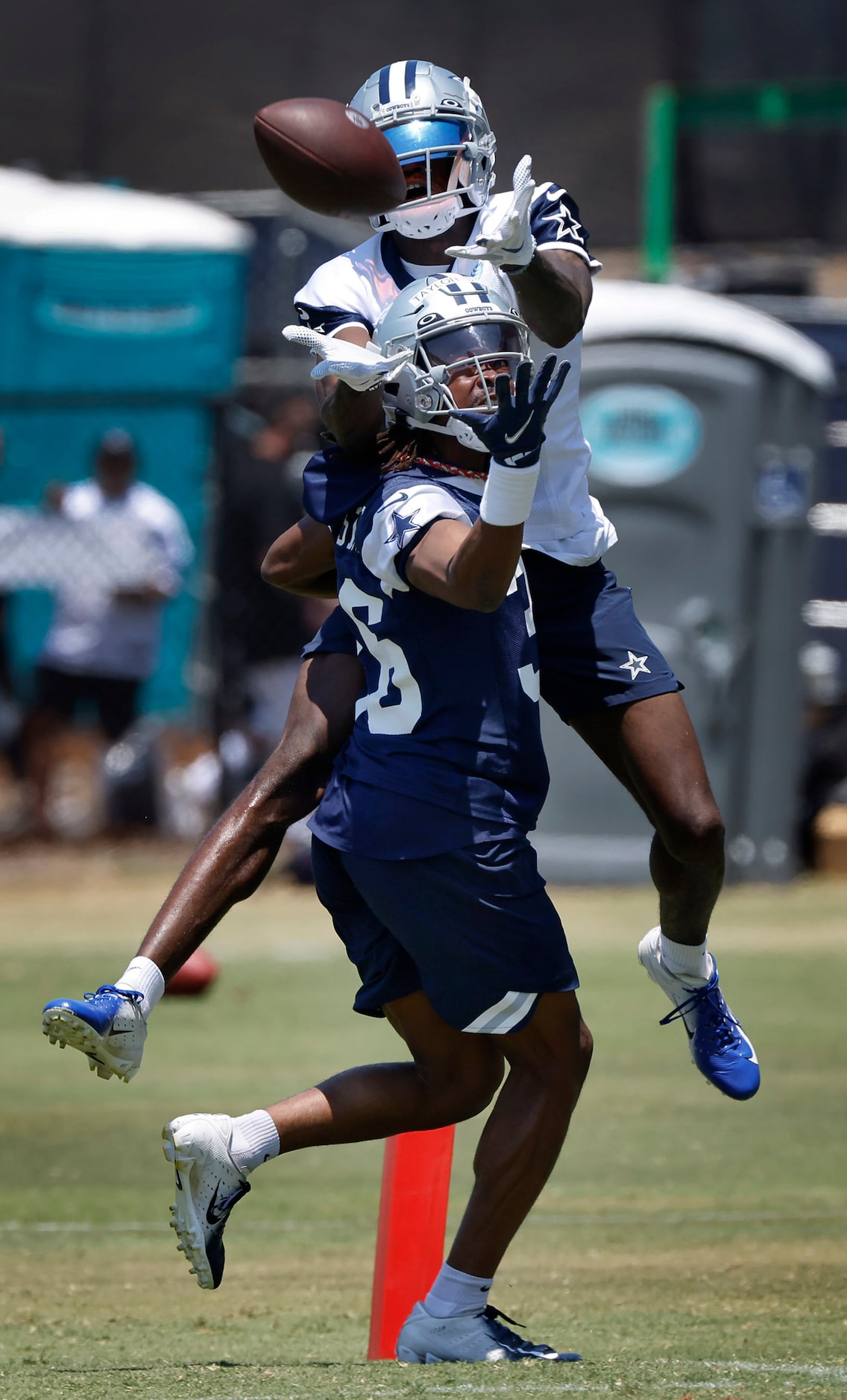 Dallas Cowboys wide receiver T.J. Vasher (16) goes up and over cornerback Isaac...