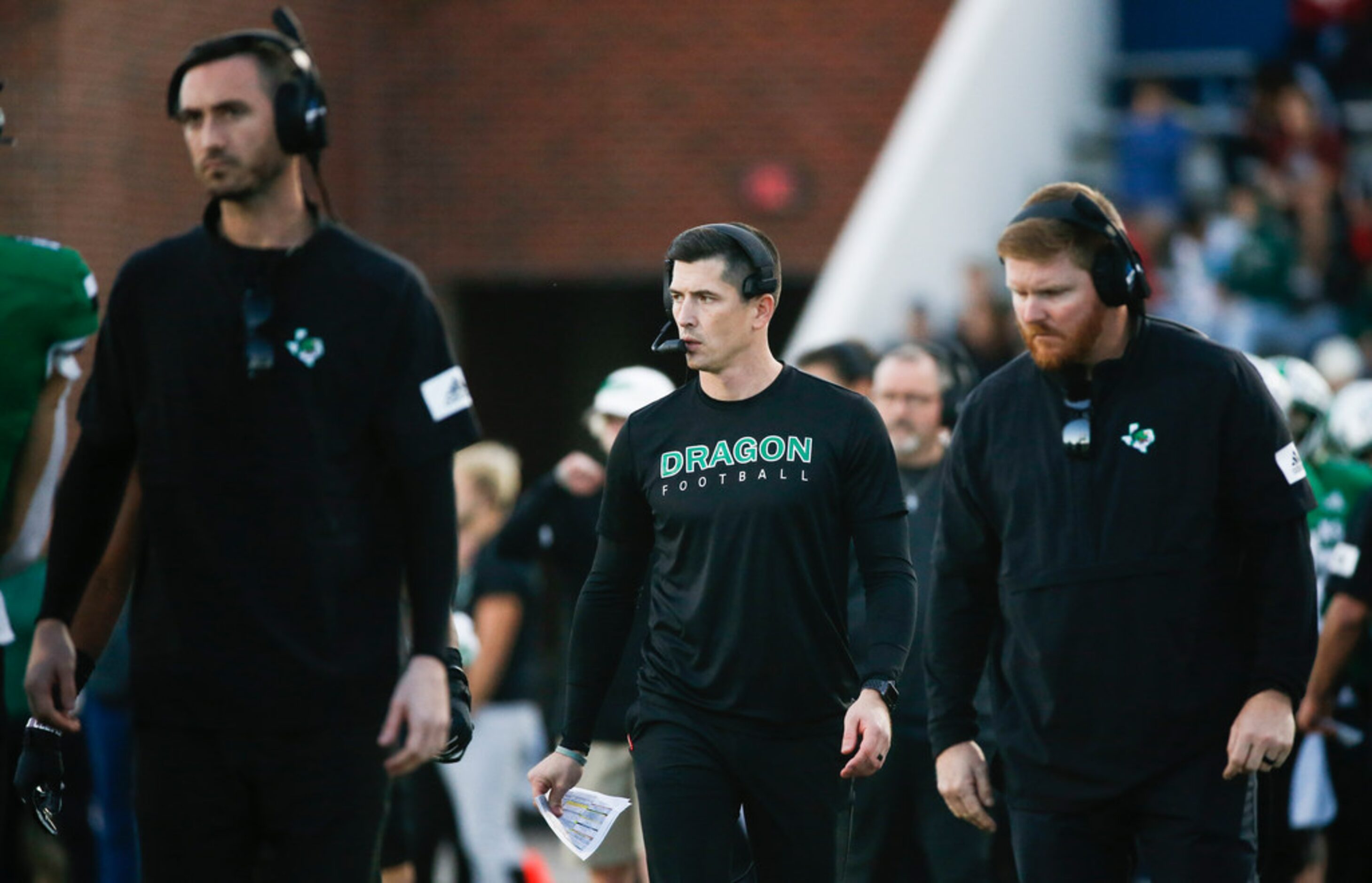 Southlake Carroll head coach Riley Dodge, center, works the sideline during the second half...