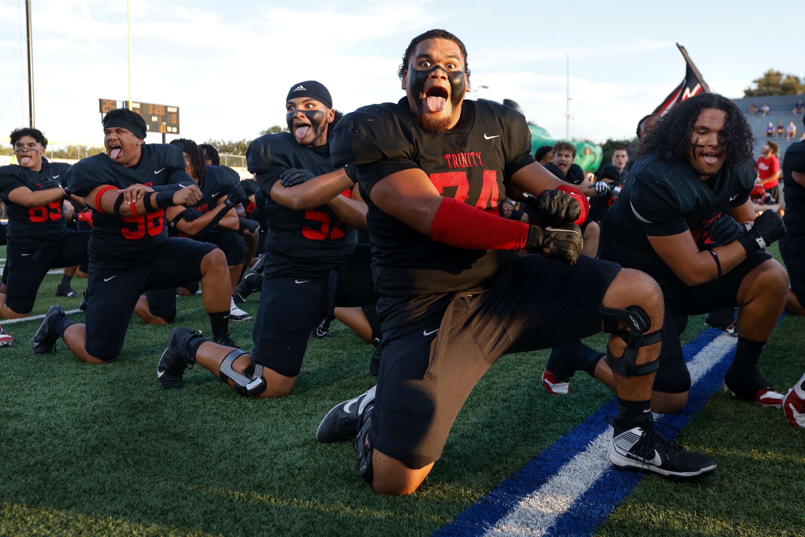 Euless Trinity offensive lineman Philip Tuipulotu (74) leads the team in the Sipi Tau before...