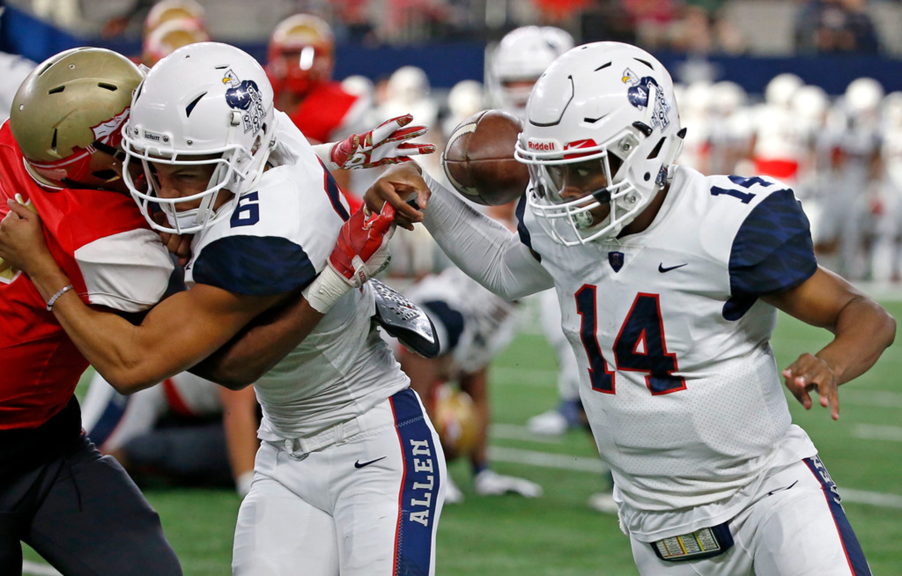 South Grand Prairie's Earl Pugh (left) forces Allen quarterback Grant Tisdale (14) to fumble...