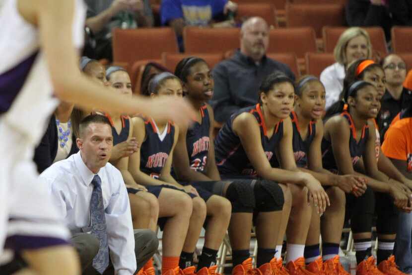 McKinney North head coach Michael Oldham nervously watches first quarter action against...