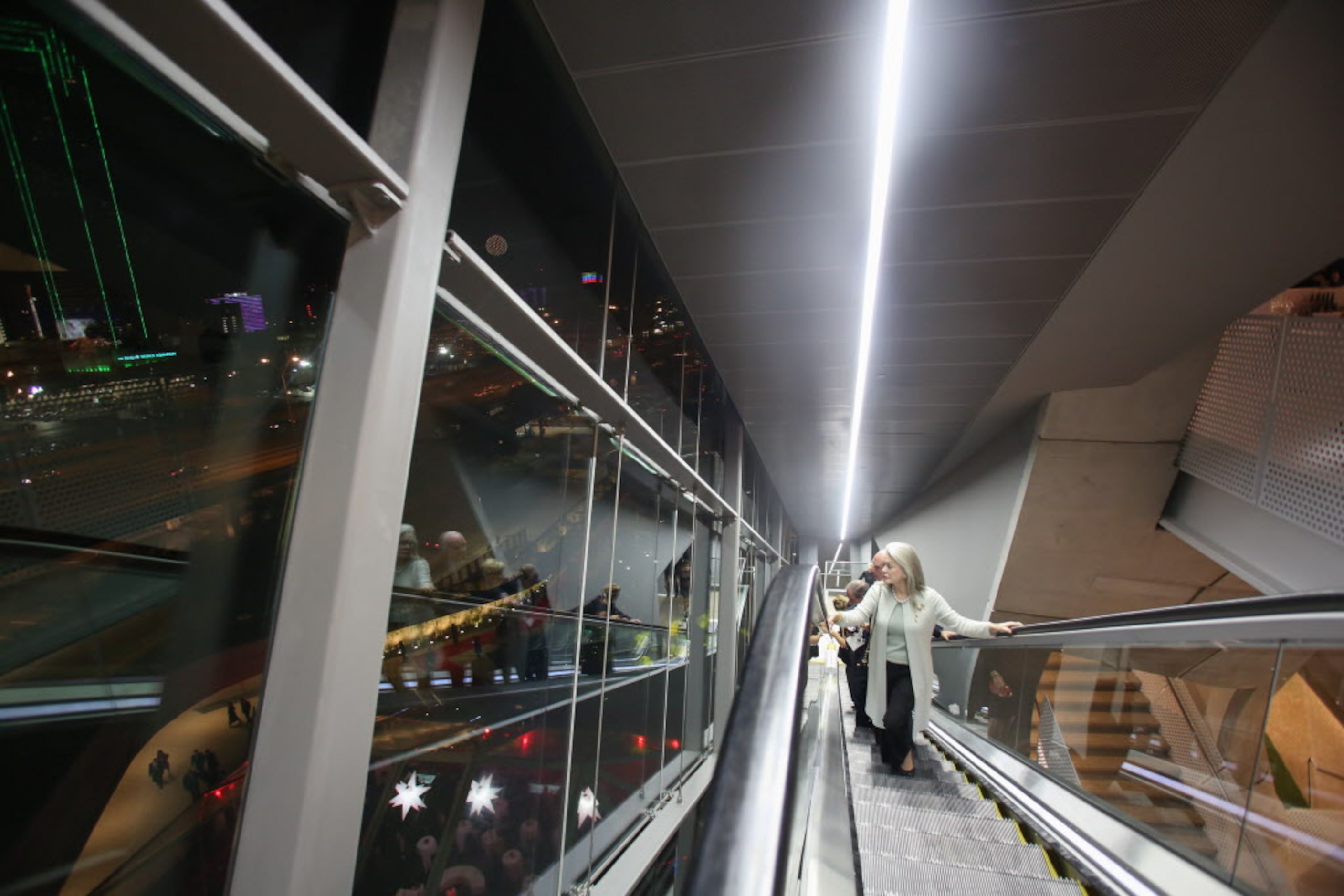 Lynne Sheldon and her husband, Roy Sheldon, enjoy the view of downtown Dallas as they ride...